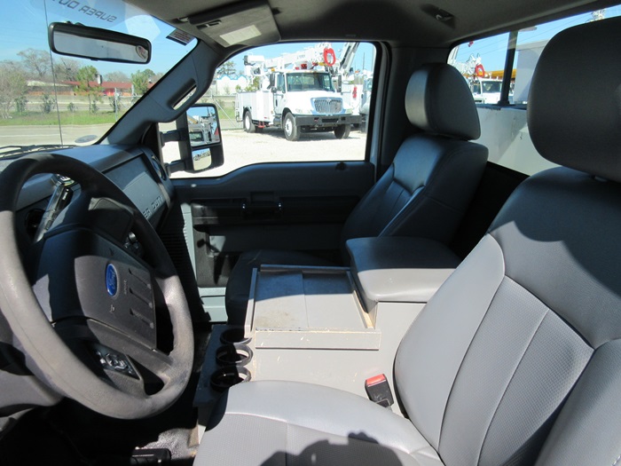 Bucket truck with bucket seats.