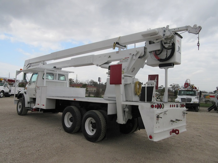 Material handler on bucket truck.