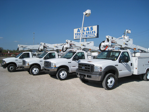 This is a group of fleet maintained one ton bucket trucks for sale.