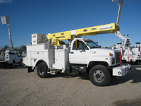 Over center boom bucket trucks.