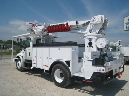 Rear mount digger.
