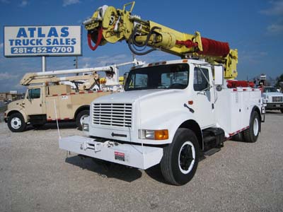 Digger truck with front winch.