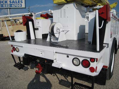 Digger truck with Pintle hitch.