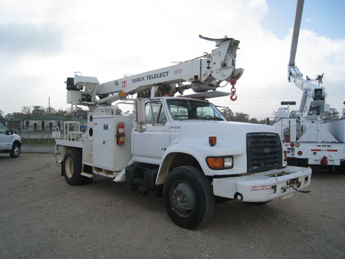 Digger truck with pole claws.