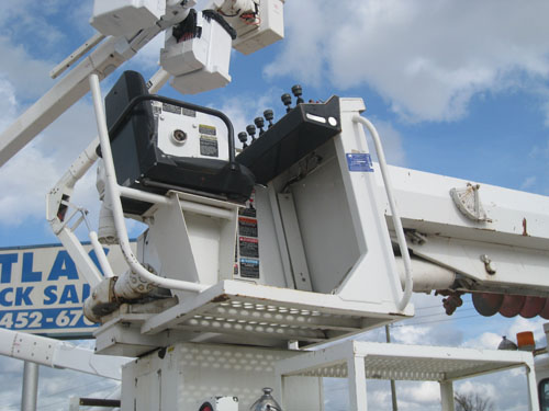 Upper controls on digger truck.