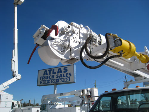 Digger truck with pole claws.