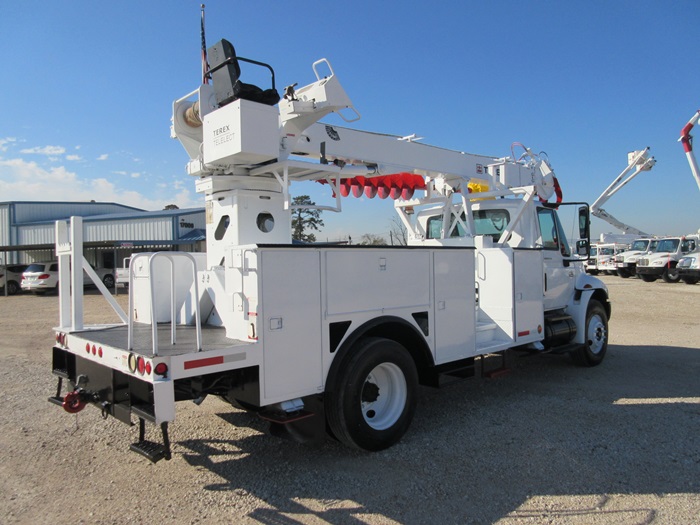 Digger with riding console.