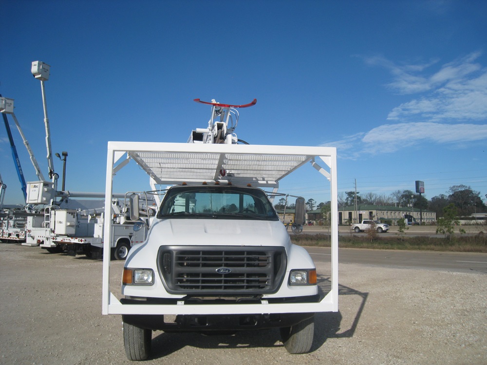 Boom tip winch digger truck.