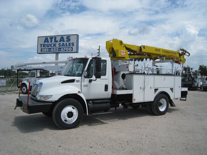 Dual contorl digger truck.