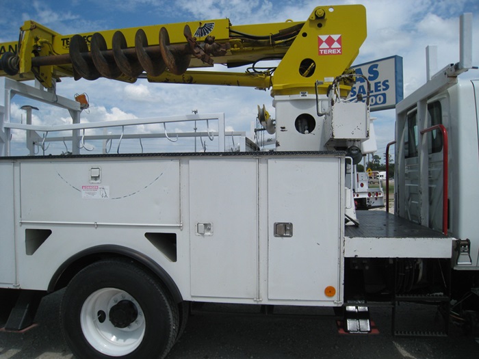 Curb side access digger truck.