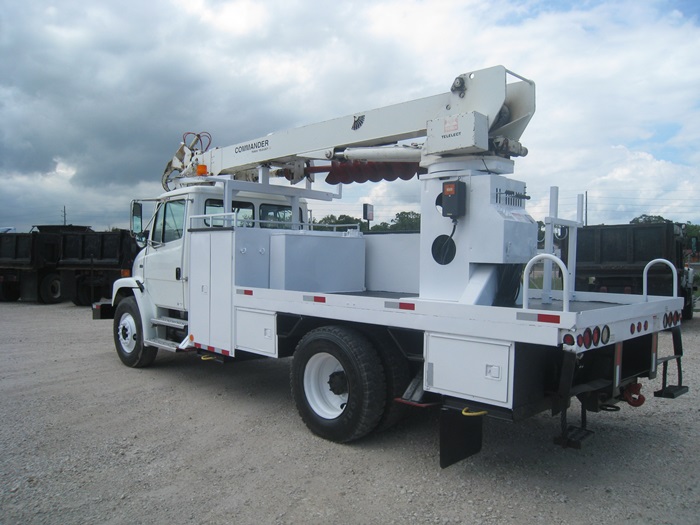 Center Rear Mount Boom Digger Truck.