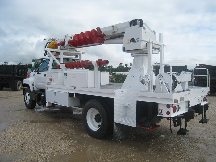 Flatbed Auger Digger Truck.