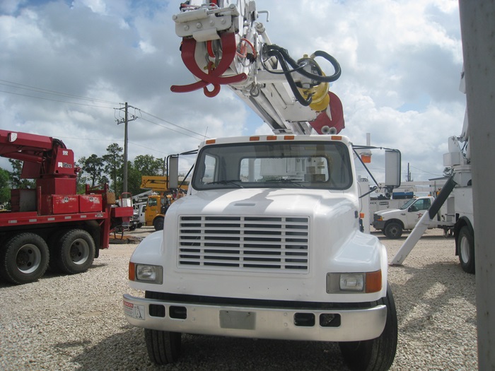 Digger Derrick Truck with pole claws.