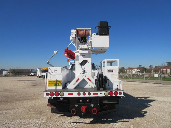 Digger truck with hose reel.