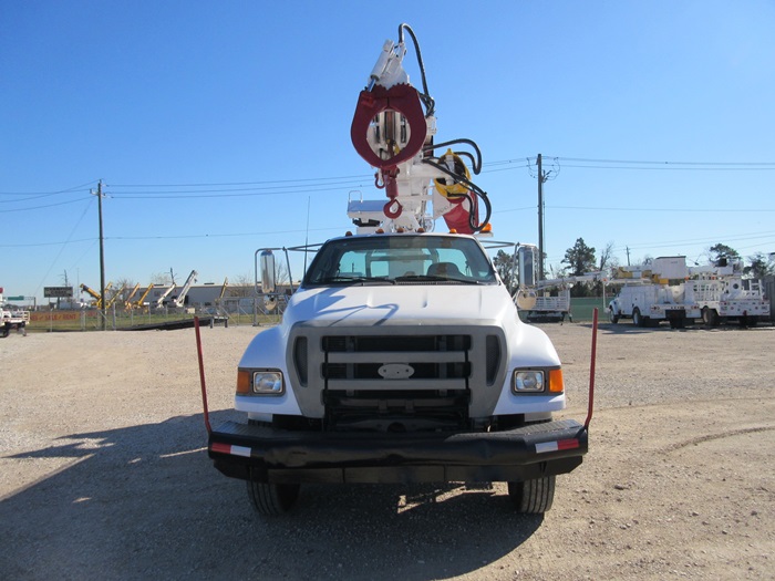 Digger truck with boom tip winch.