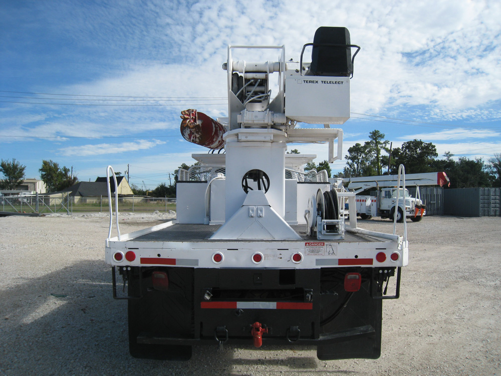 Center mount digger truck.