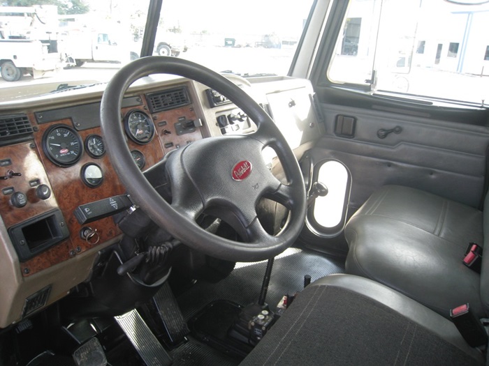 Cab in bucket truck.