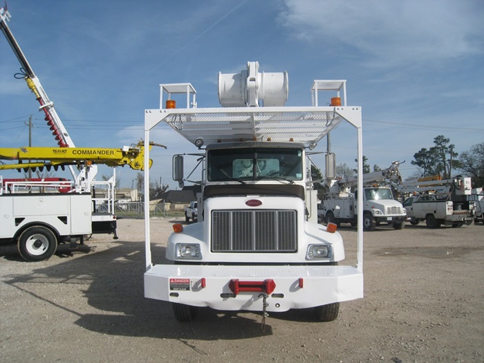 Peterbilt bucket trucks with front winch.